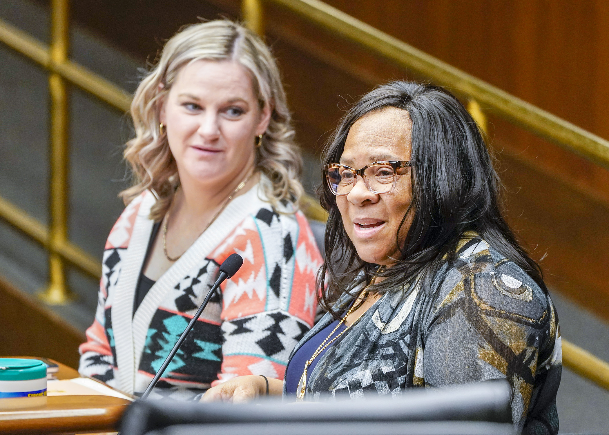 Duluth City Council President Janet Kennedy testifies before the House's transportation committee March 3 in support of a bill sponsored by Rep. Erin Koegel, left, to fund a passenger rail line between Minneapolis and Duluth. (Photo by Andrew VonBank)